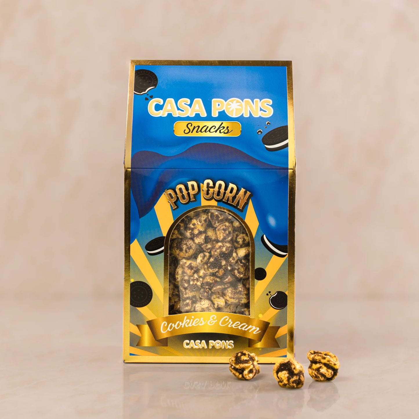 Casa Pons snacks packaging for cookies & cream popcorn on a beige background
