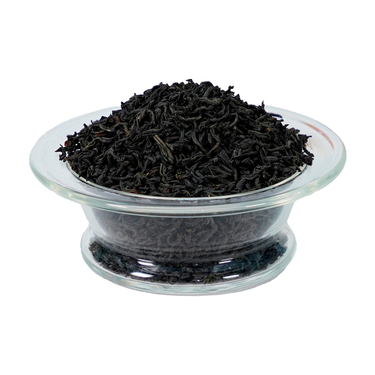 A clear glass bowl filled with black loose tea leaves.