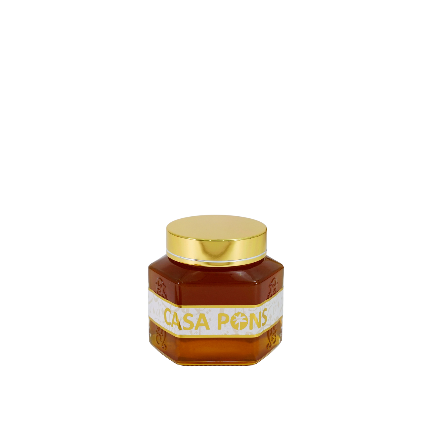 Jar of Casa Pons honey with a gold lid on a white background