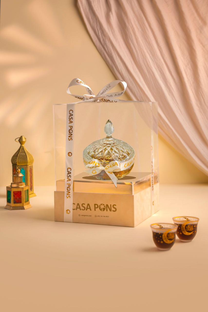 Casa Pons perfume bottle with packaging on a beige background