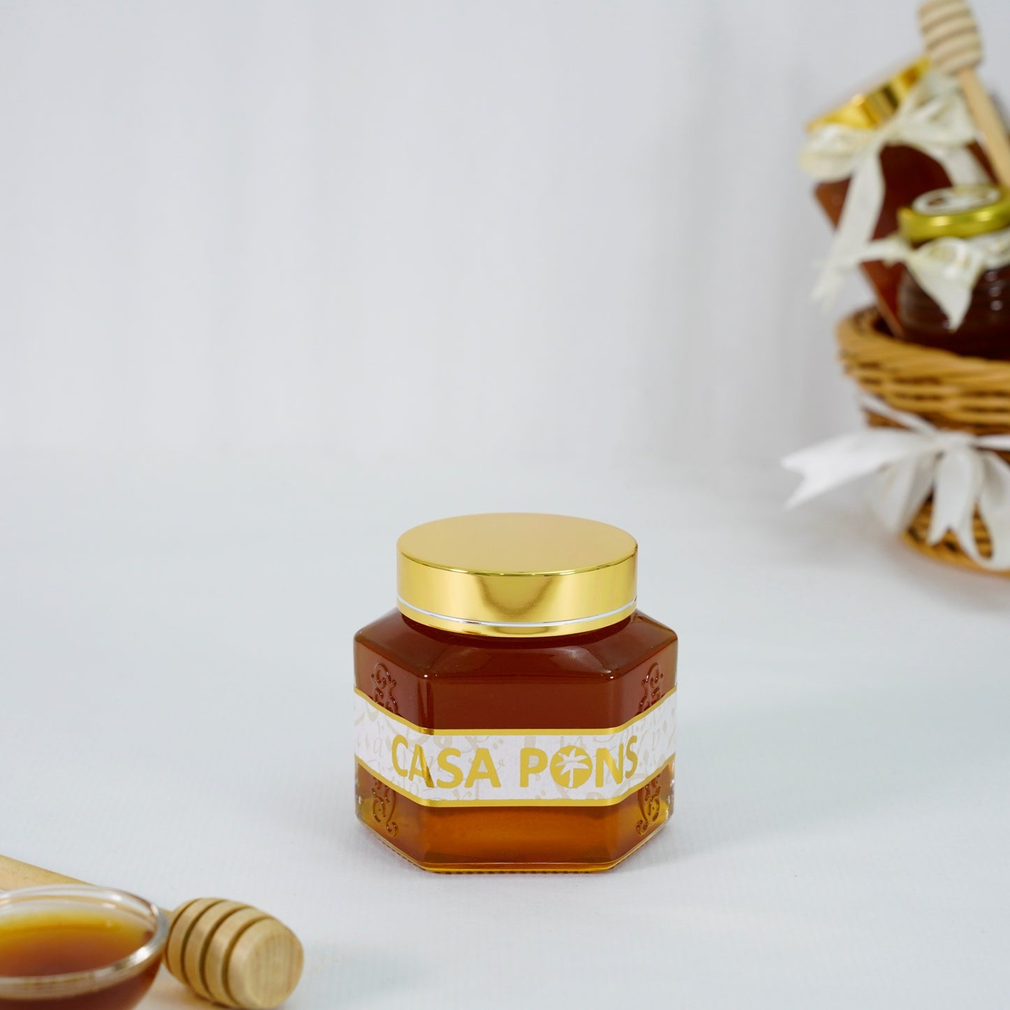 Jar of Dawani honey showing raw unfiltered honey with a rich texture and natural golden color