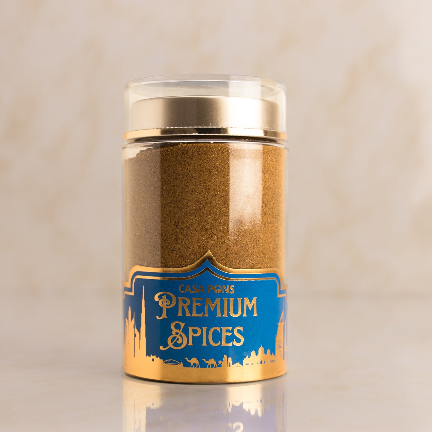 Jar of premium spices with a blue label on a beige background
