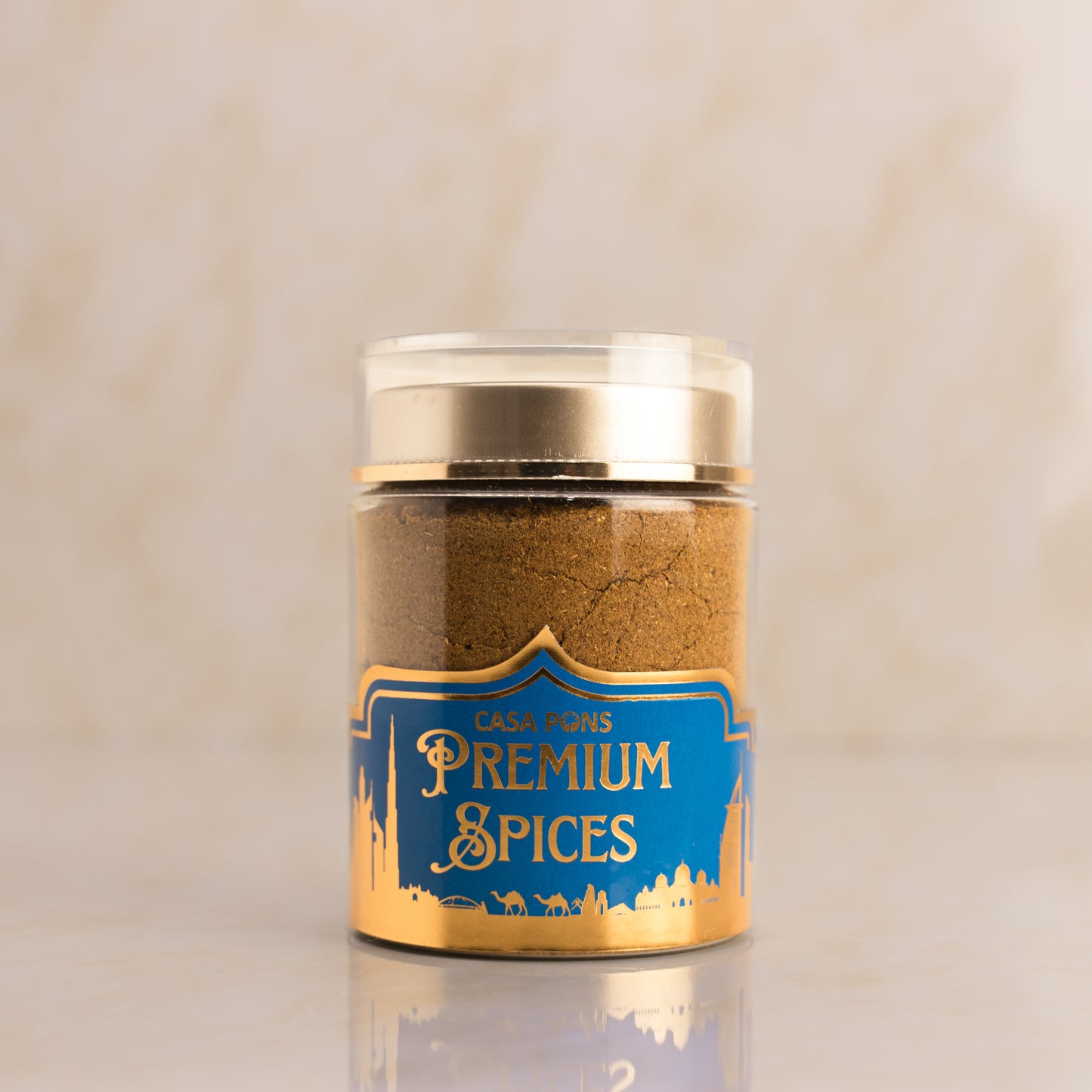 Jar of premium spices with a blue label on a beige background