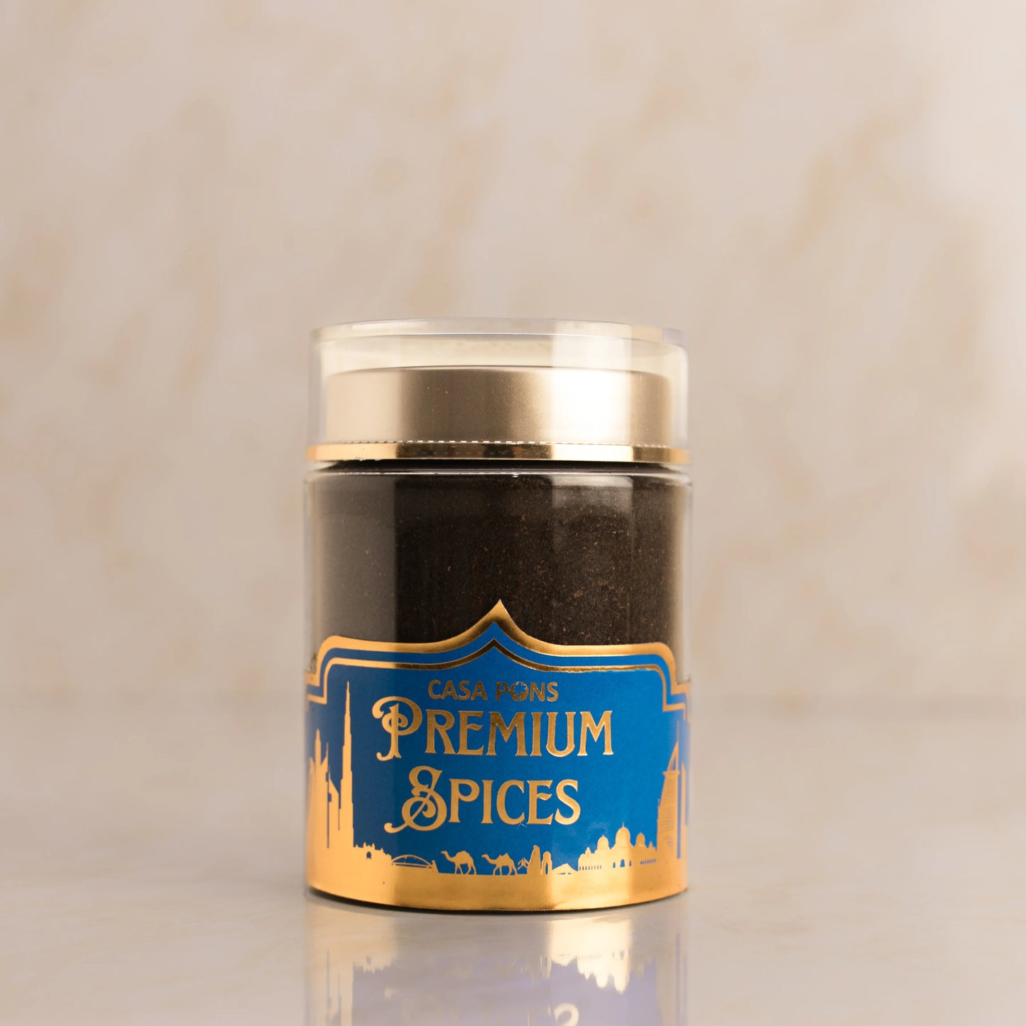 Jar of premium spices with a blue label on a beige background