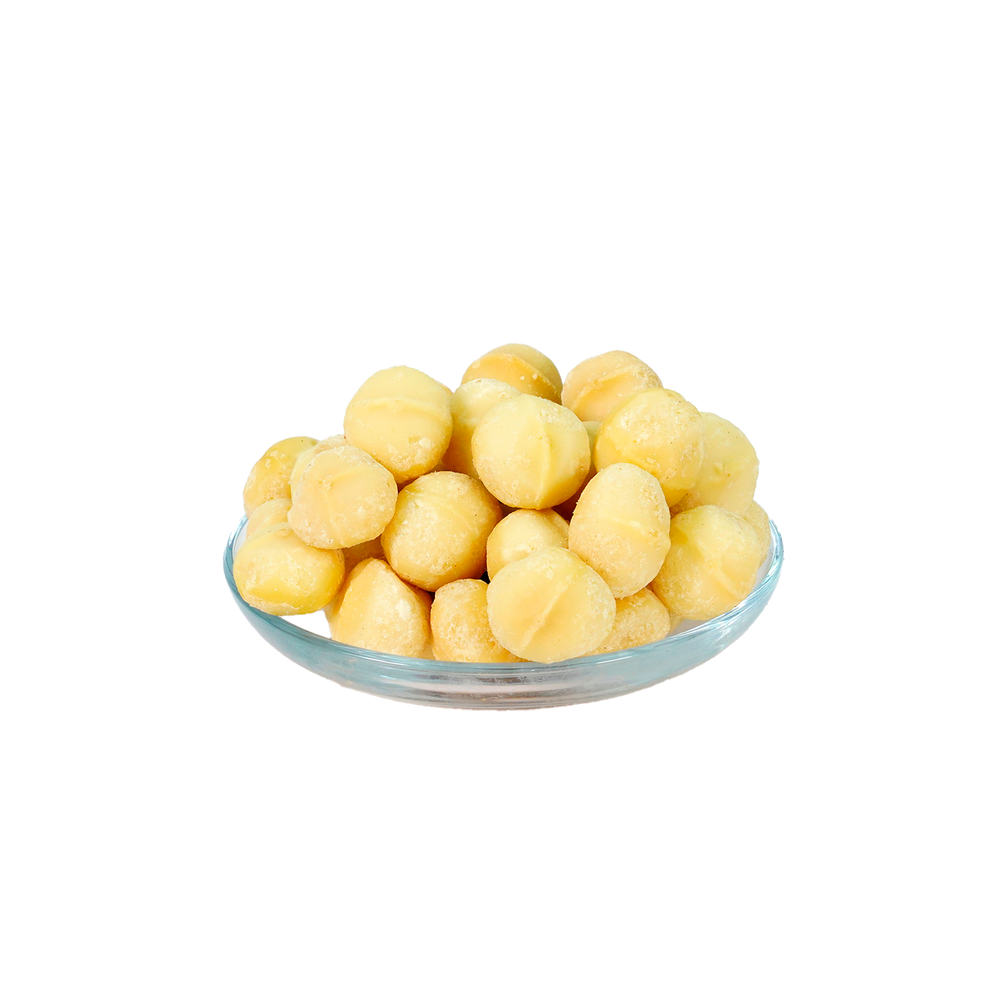 A clear glass bowl filled with roasted, salted macadamia nuts against a black background.