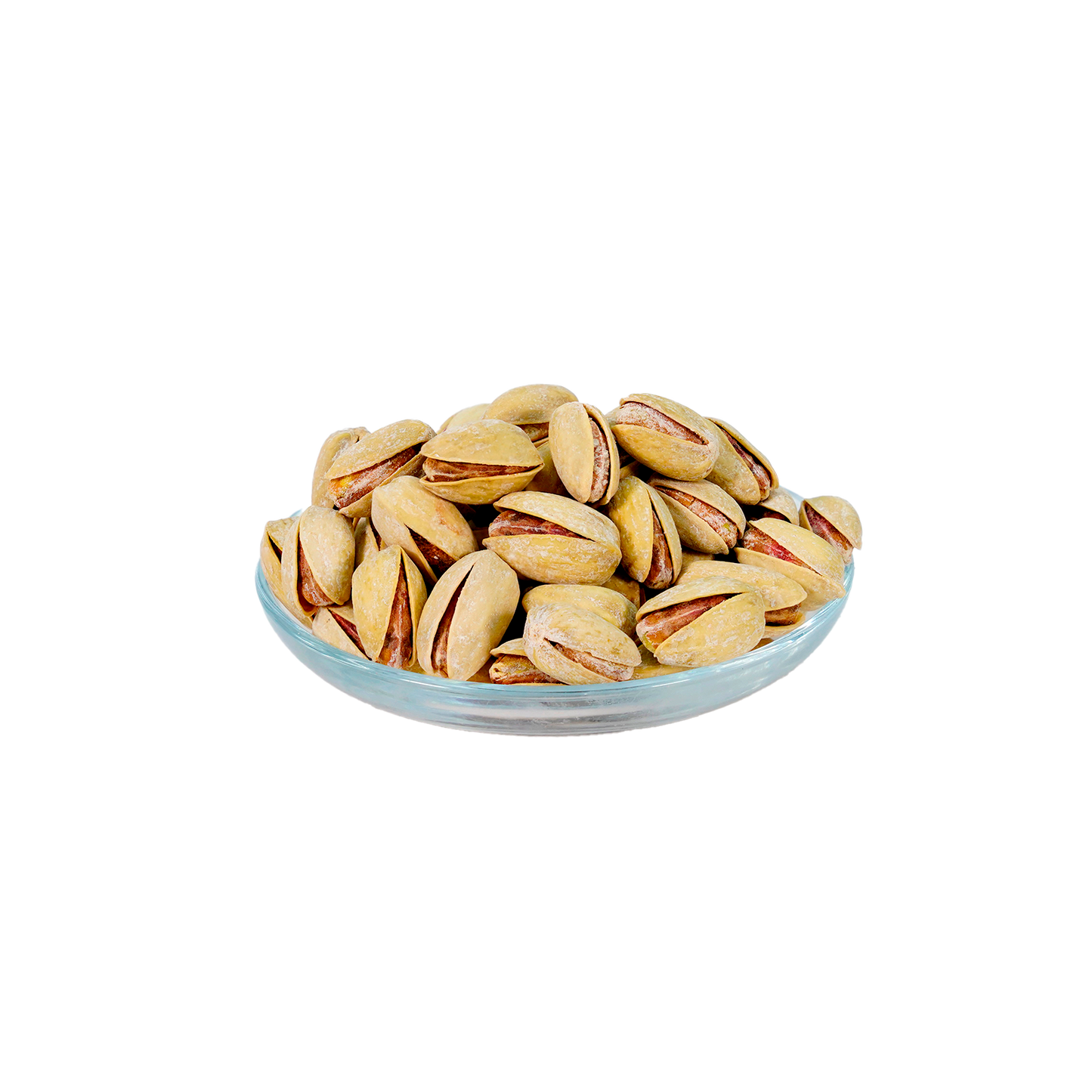 A bowl of pistachio kharouf, which are salted pistachios, against a white background.
