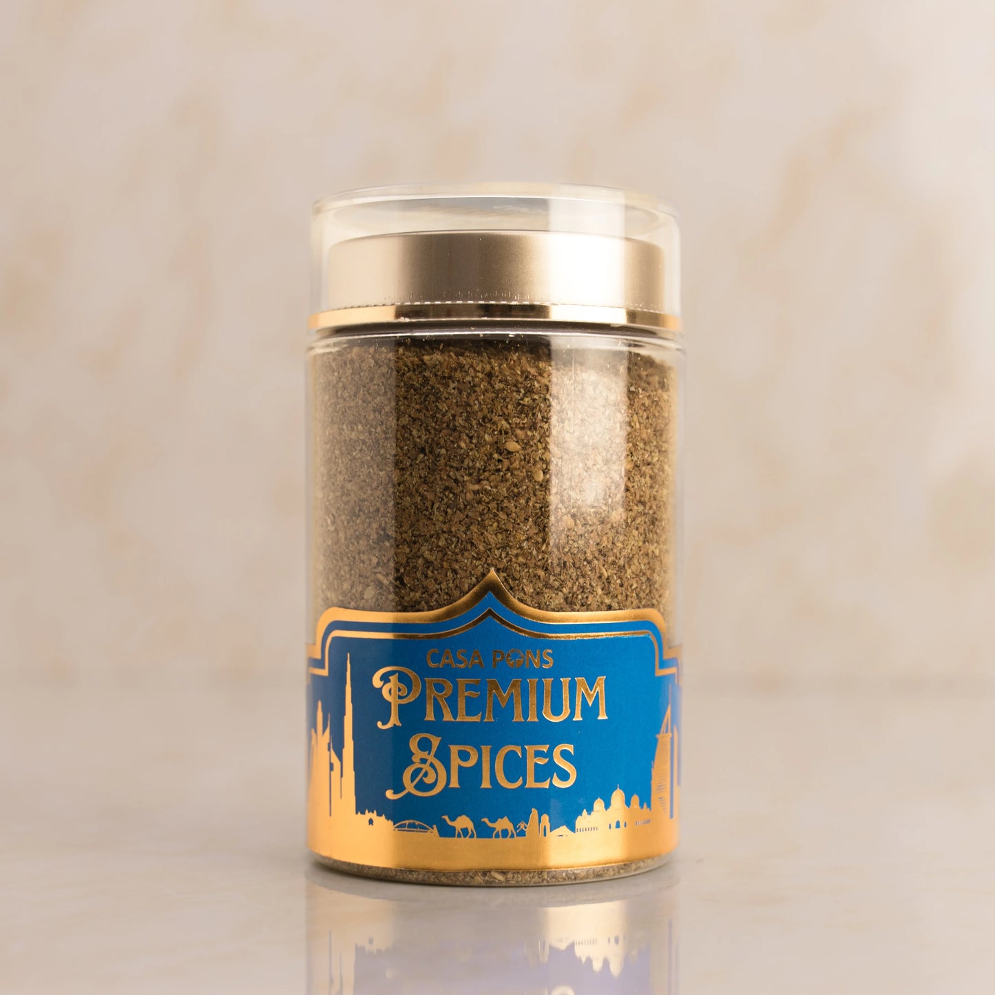 Jar of premium spices with a blue label on a beige background