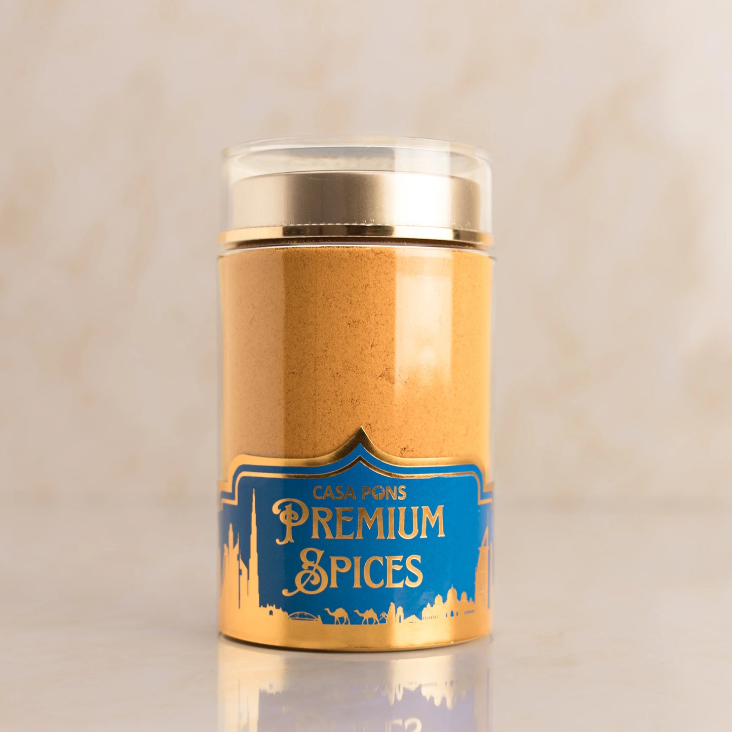 Jar of premium spices with a blue label on a beige background