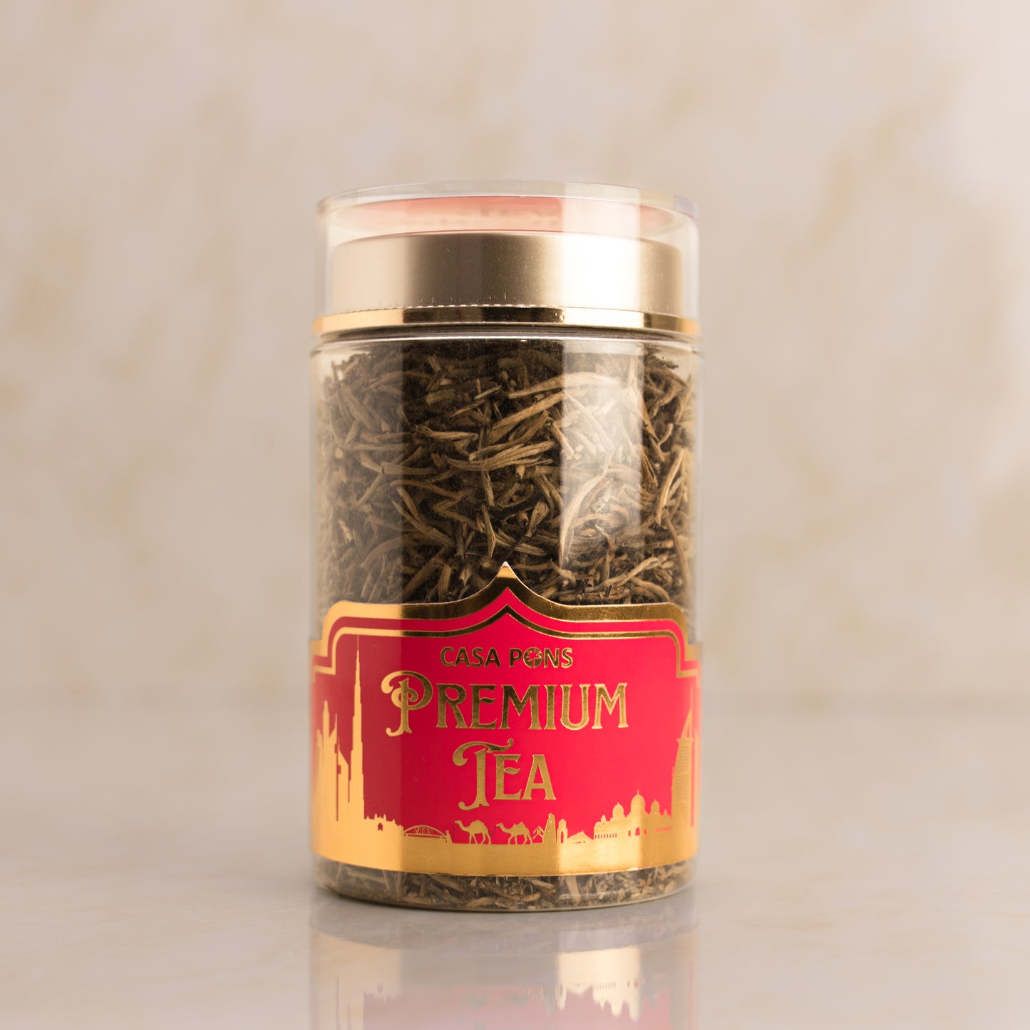 Jar of Casa Pons Premium Tea with a red label on a beige background