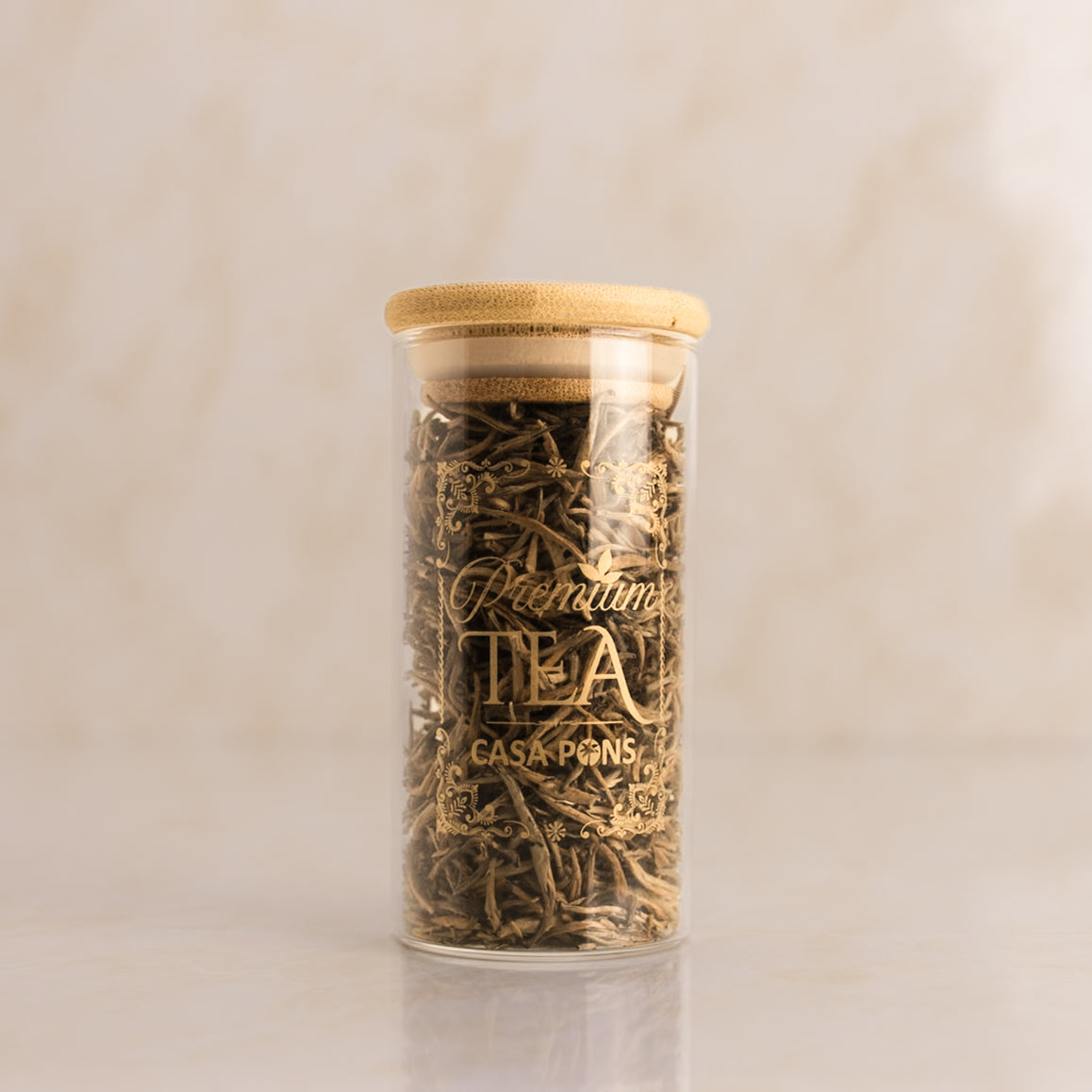 Jar of tea leaves with a wooden lid on a beige background