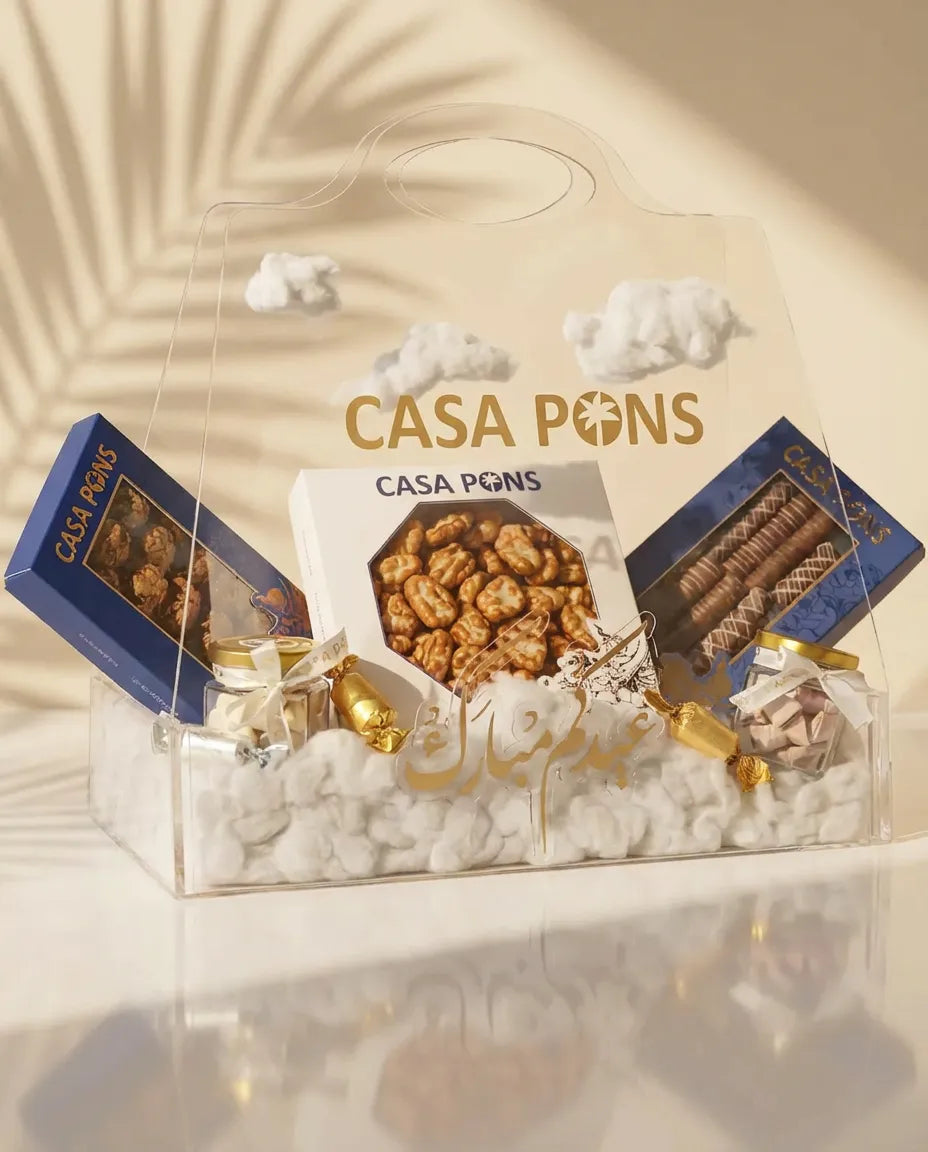 Cloudy acrylic Eid basket with pecan sweets London sticks hazelnut lotus jar white chocolate pistachio jar Dubai