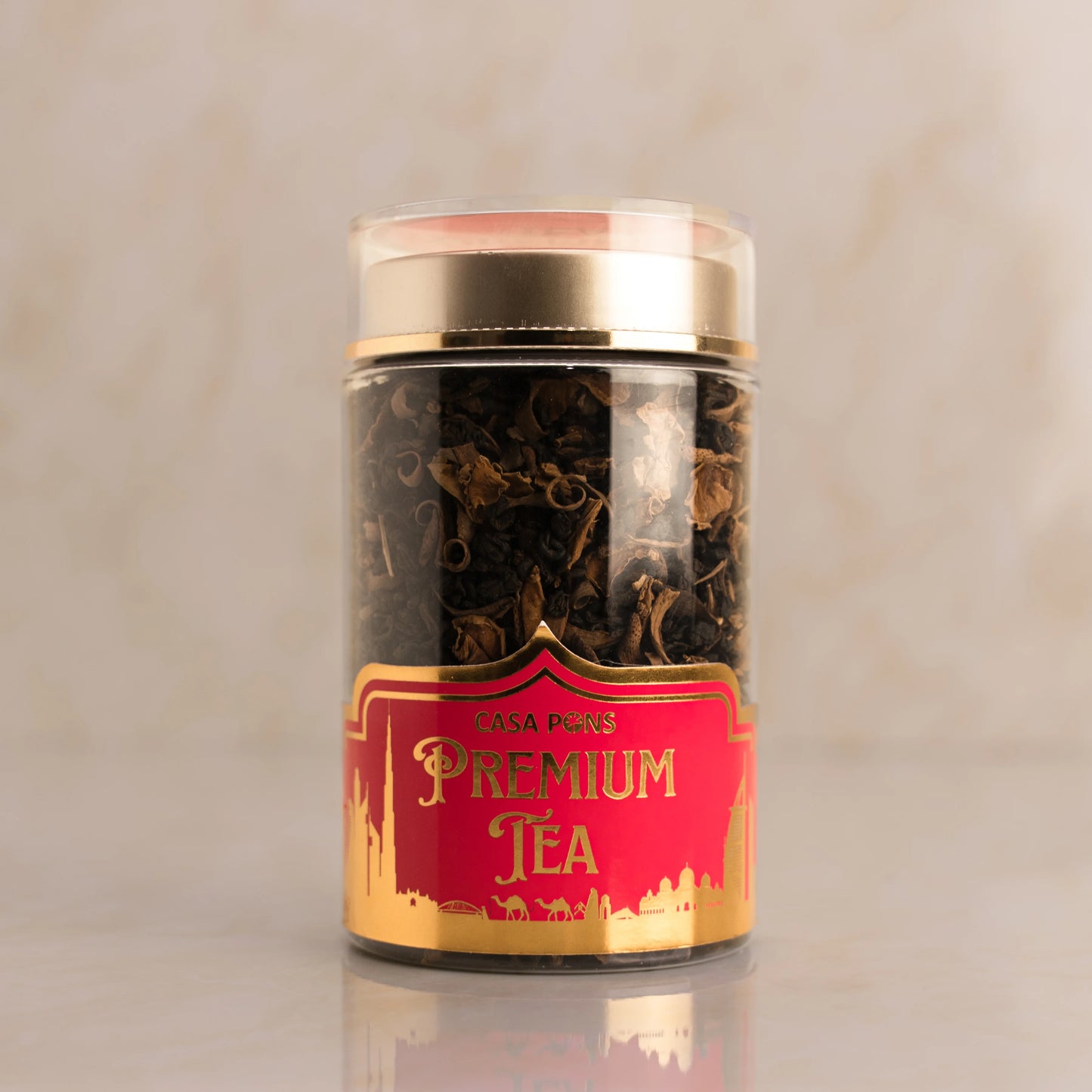 Jar of Casa Pure Premium Tea with a red label on a beige background
