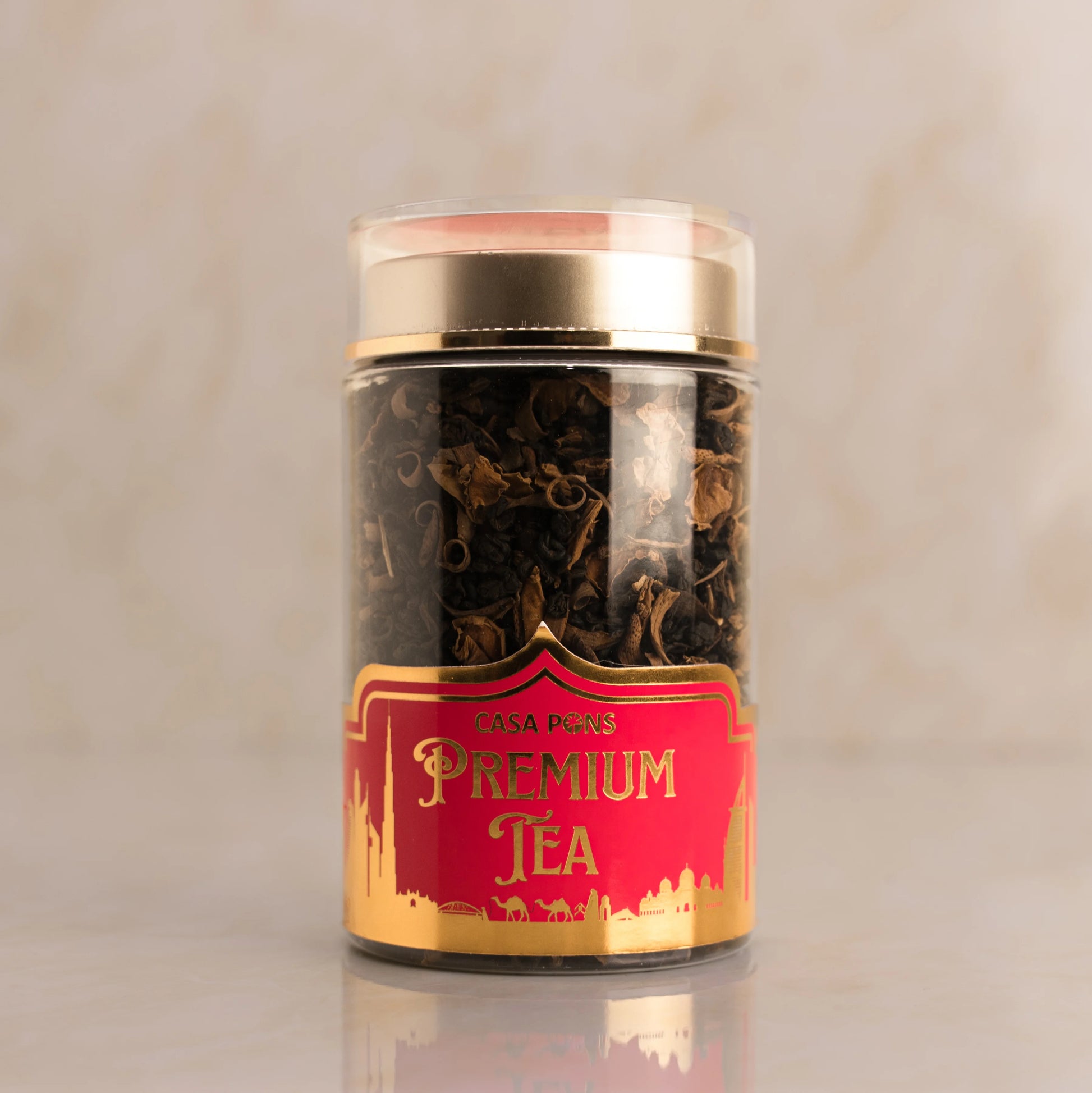 Jar of Casa Pure Premium Tea with a red label on a beige background