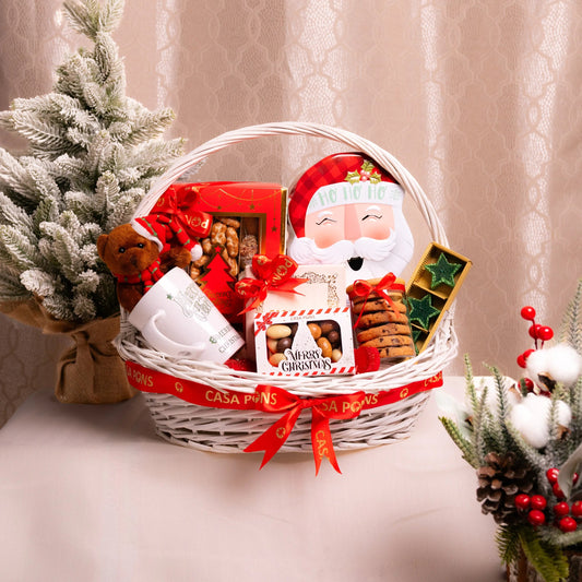 Christmas gift basket with Santa Claus design on a neutral background