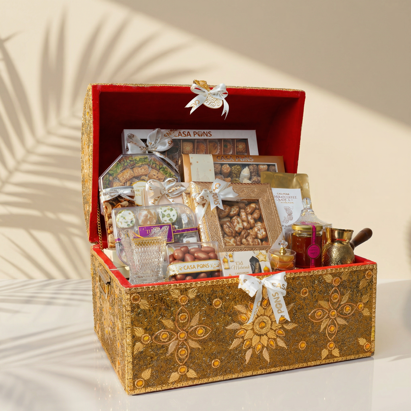 Tresor large luxury Eid gift chest with Arabic sweets baklava pecan caramel honey Turkish coffee tea nuts chocolates and bukhoor burner Dubai