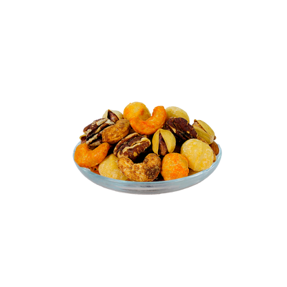 A bowl of mixed nuts and dried fruits against a white background.