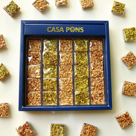 Casa Pons chocolate assortment in a blue box on a light background