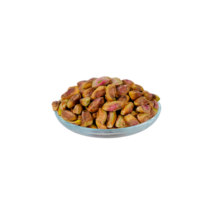 A plate of pistachio nuts against a white background