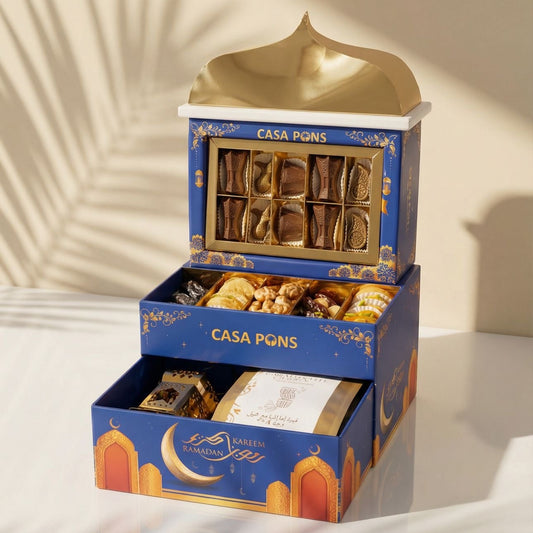 The Ramadan Castle three tier Ramadan tower with chocolates, dates, stuffed fruits, pecan caramel, Emirati coffee with cardamom and saffron, and a Ramadan lantern