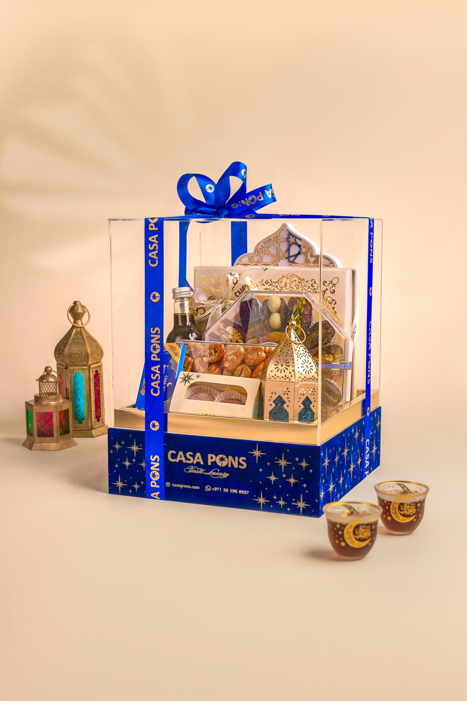 Gift basket with Casa Pons branding on a beige background