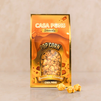 Casa Pons snacks packaging for pop corn with cookies on a beige background