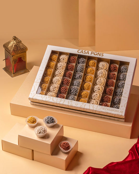 Special Date Balls Box showing bite-sized date balls neatly arranged in a sharing box weighing 672 grams